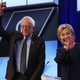Democratic presidential candidates Bernie Sanders and Hillary Clinton wave to supporters before the Univision News and Washington Post Democratic presidential primary debate at Miami-Dade College in Miami on March 9, 2016.
Joe Raedle/Getty Images